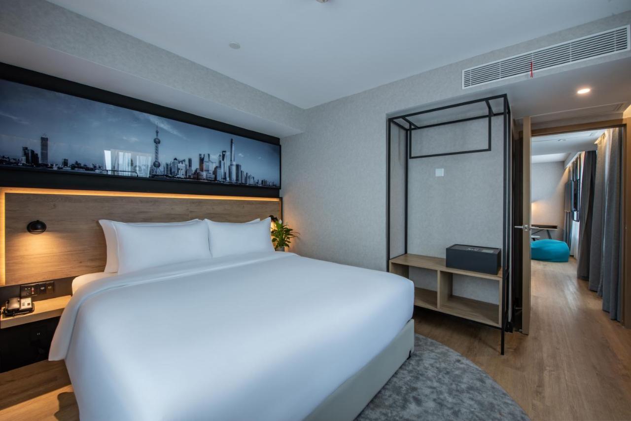 Park Inn By Radisson Shanghai Huanqiugang Экстерьер фото