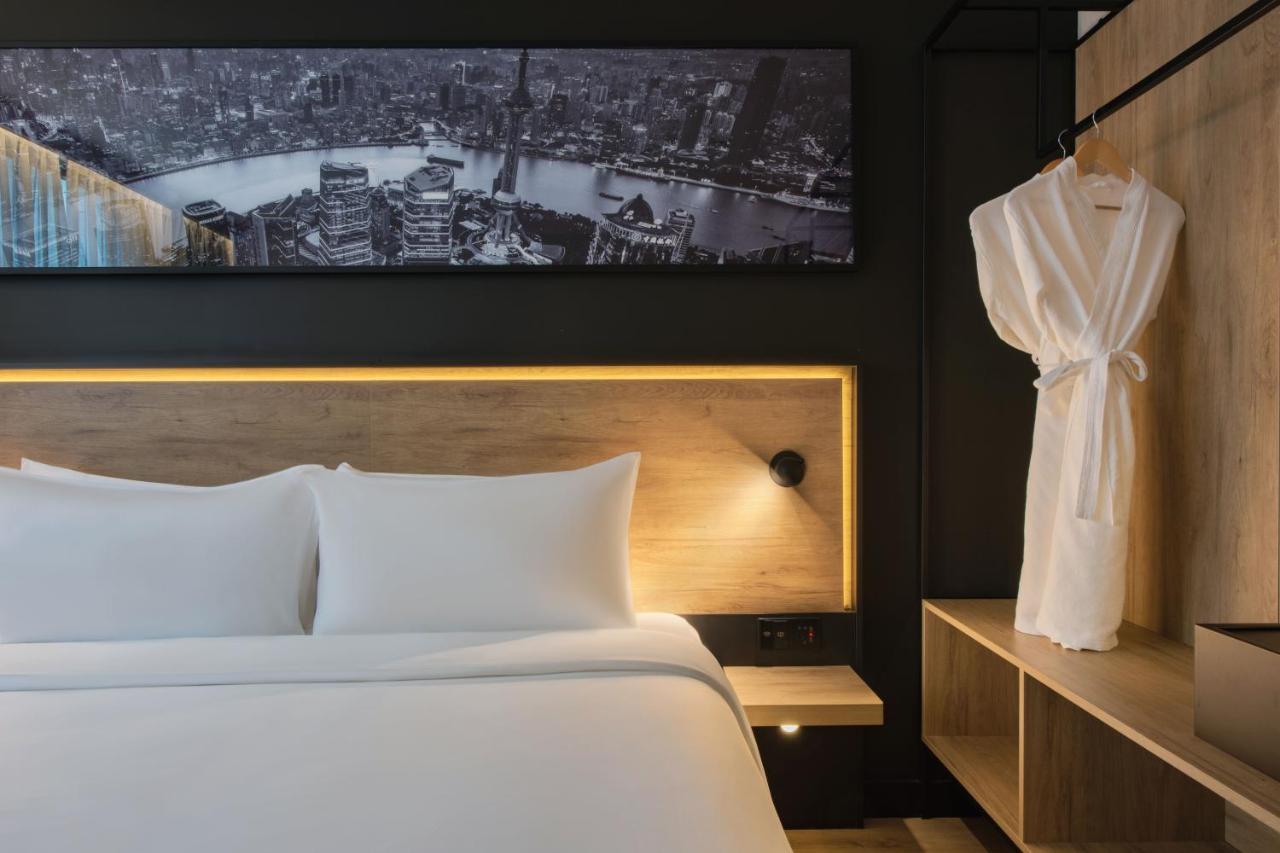 Park Inn By Radisson Shanghai Huanqiugang Экстерьер фото