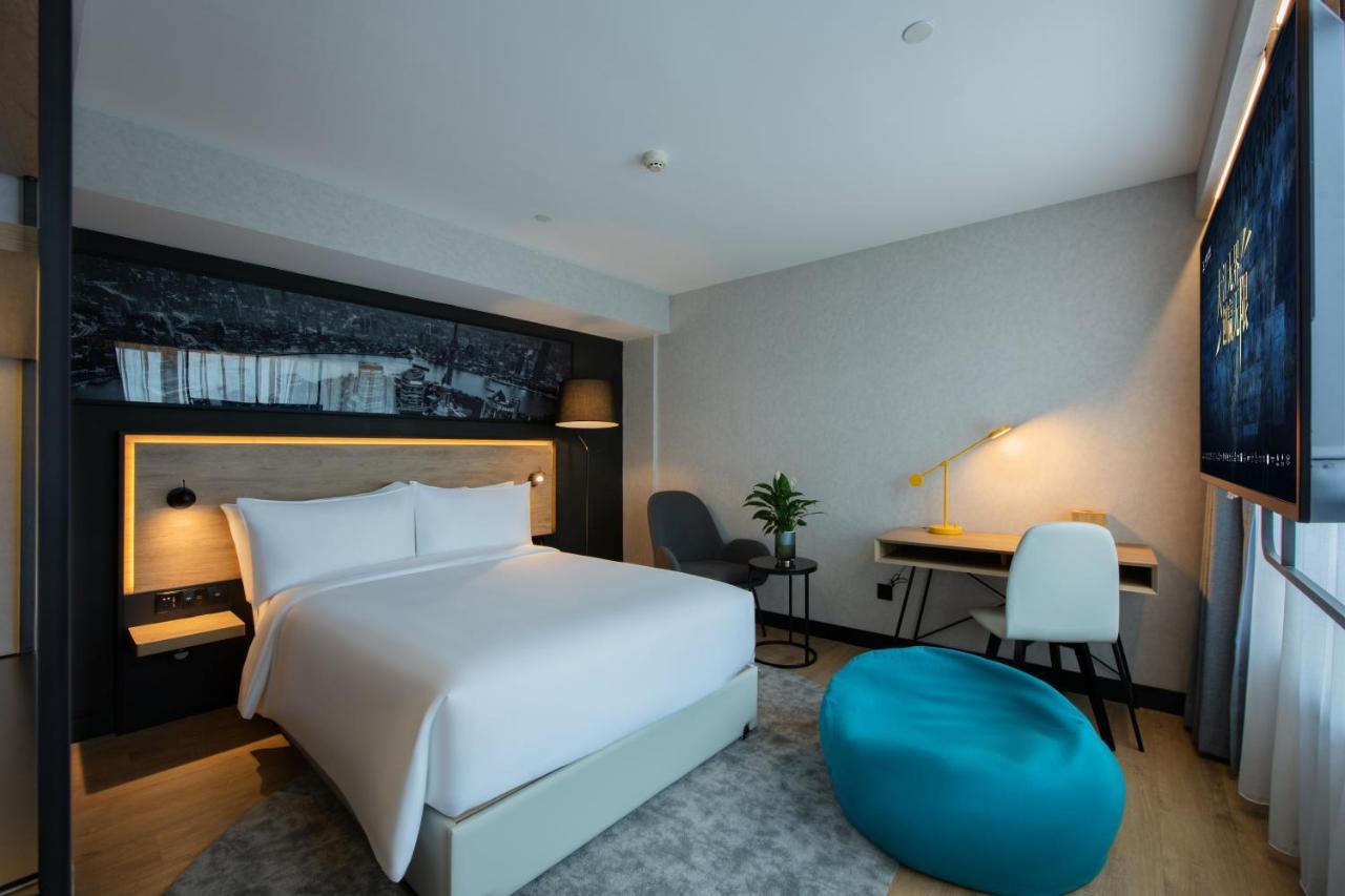 Park Inn By Radisson Shanghai Huanqiugang Экстерьер фото