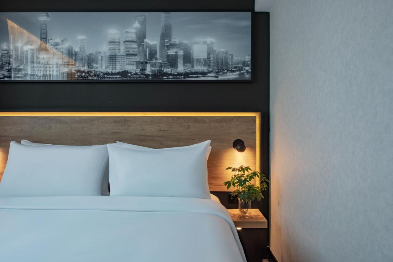 Park Inn By Radisson Shanghai Huanqiugang Экстерьер фото