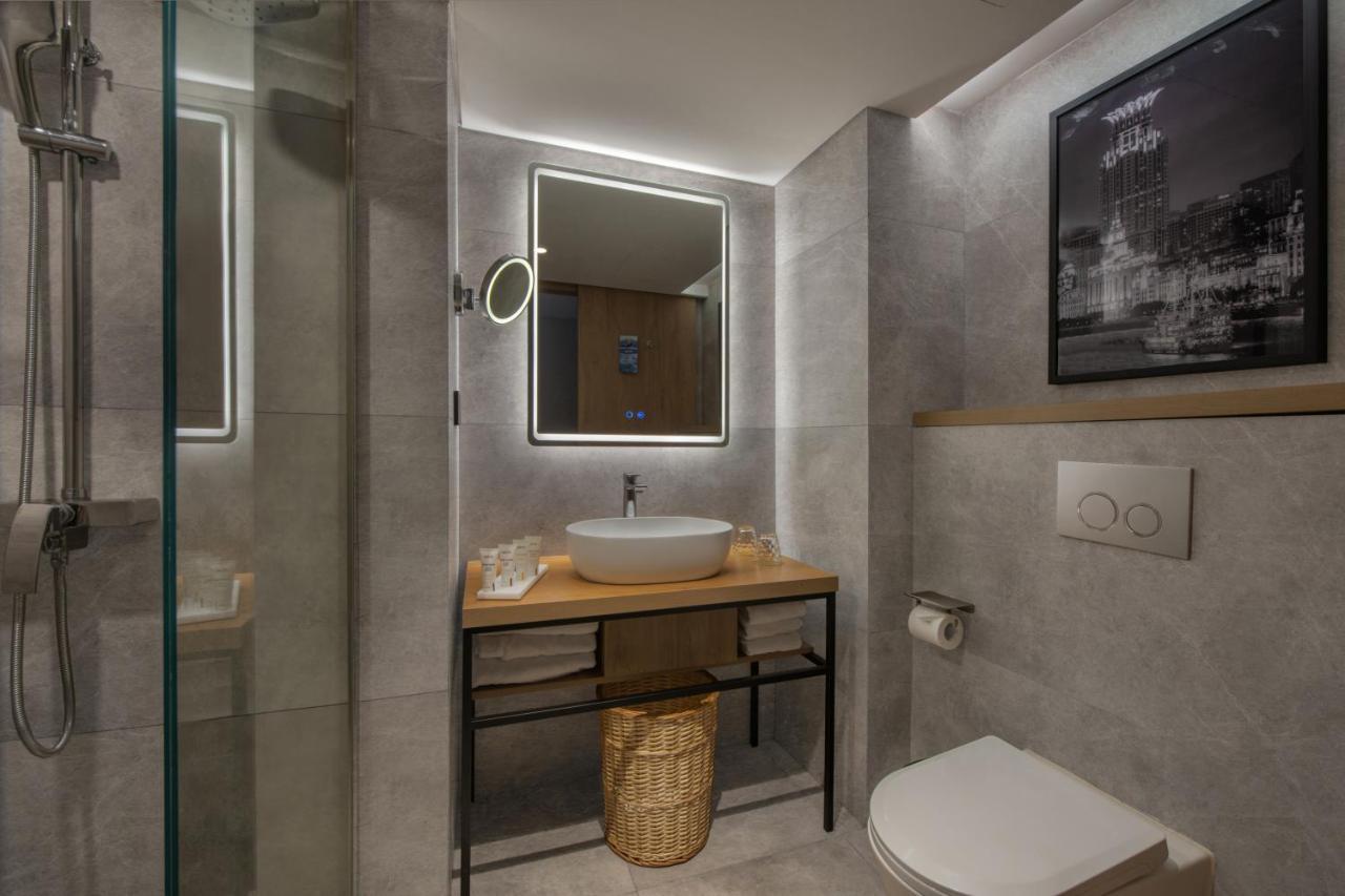 Park Inn By Radisson Shanghai Huanqiugang Экстерьер фото